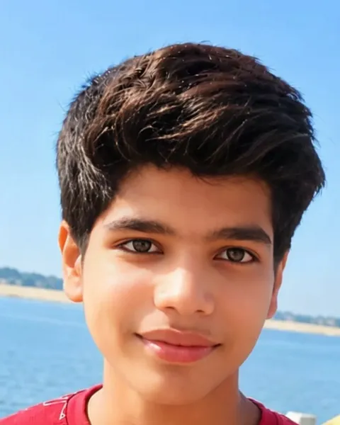 Prabhat Tiwari, smiling, by the water on a sunny day